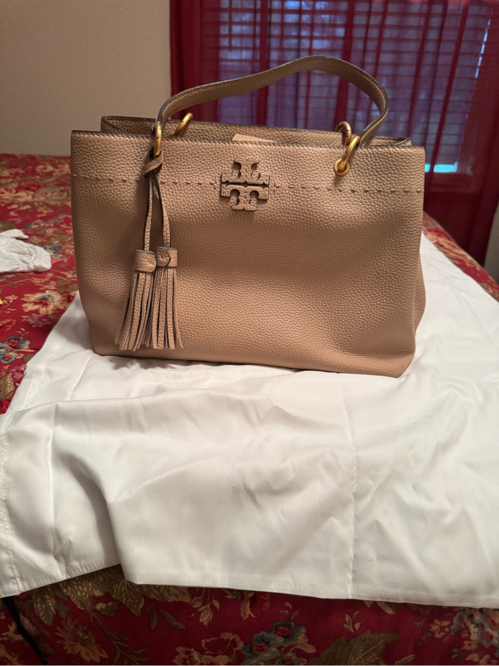 Tory Burch blush beige pebbled leather tassel satchel